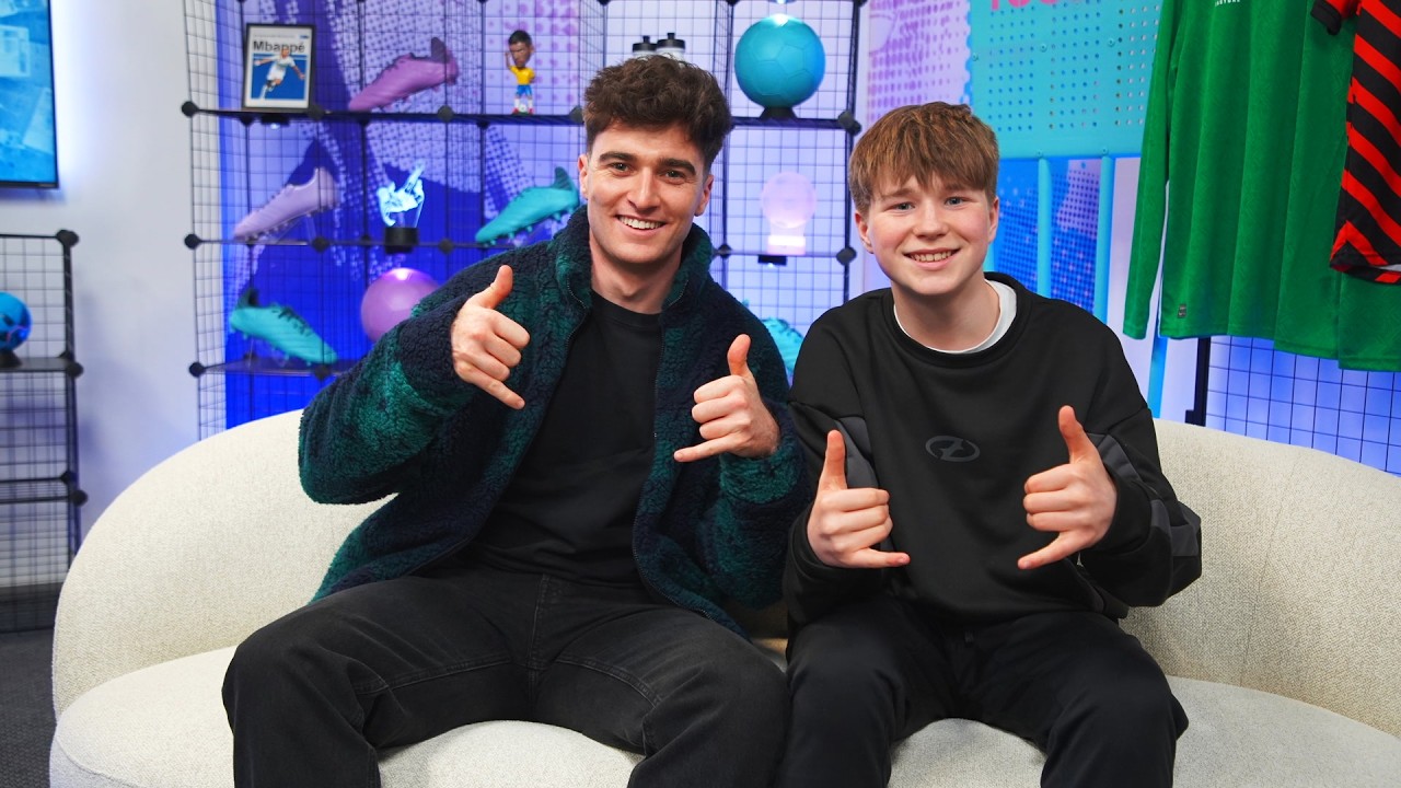 Leo with a guest on a football studio sofa